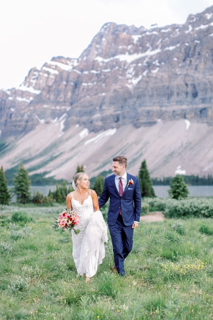 Calgary wedding Photography couple walking in the mountains