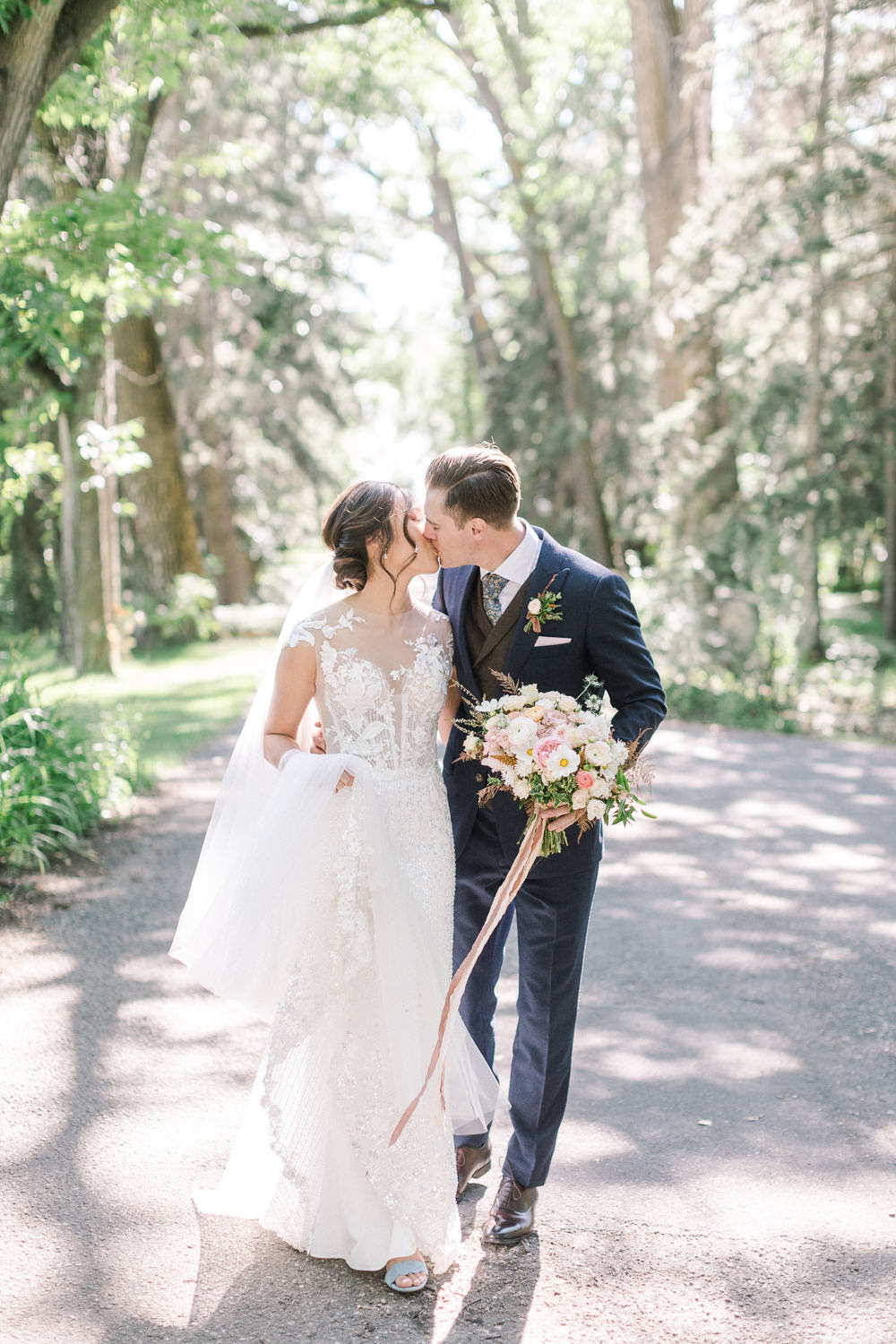 A Norland Estate Wedding Calgary wedding photographer the couple