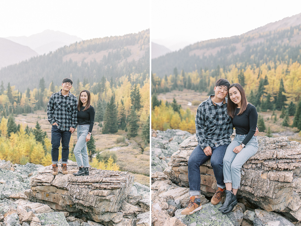 Banff fall engagement session couple portrait landscape sitting