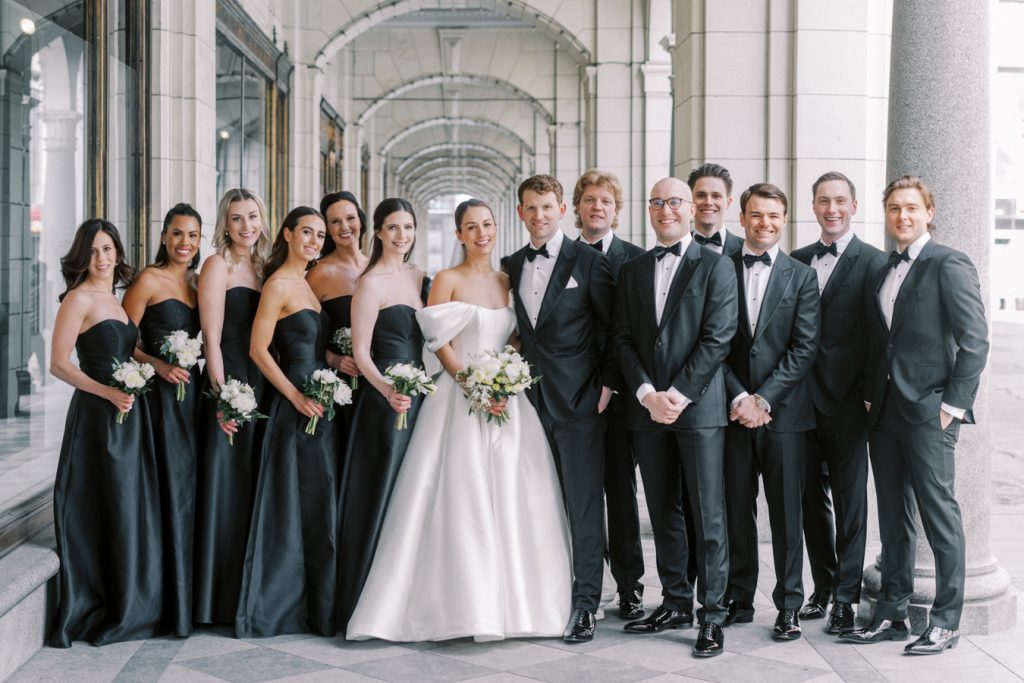 group shot of the whole bridal party at the Calgary Fairmont Palliser Hotel