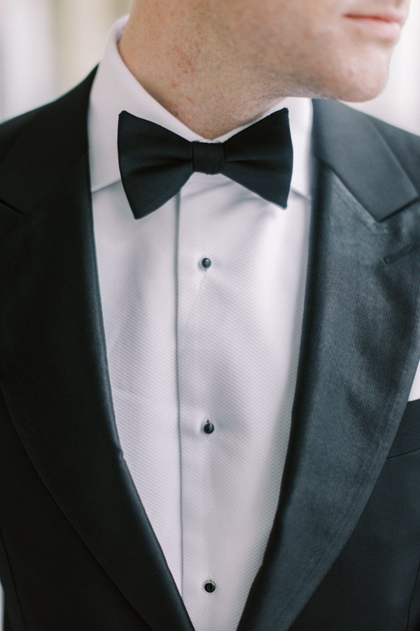 portrait of grooms bow tie at the Calgary Fairmont Palliser Hotel
