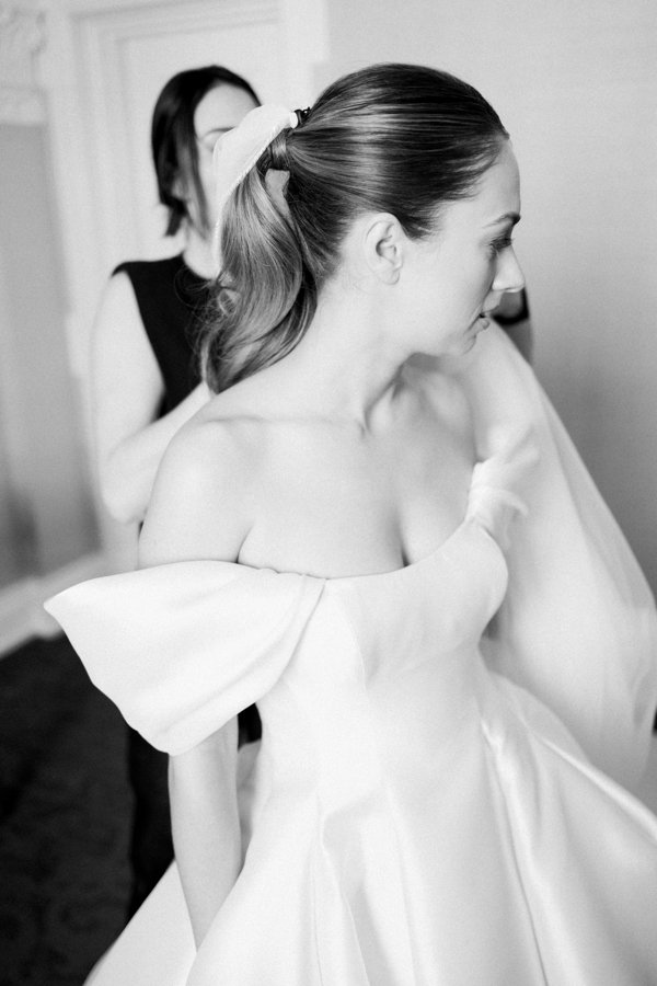 black and white photo of bride at the Calgary Fairmont Palliser Hotel