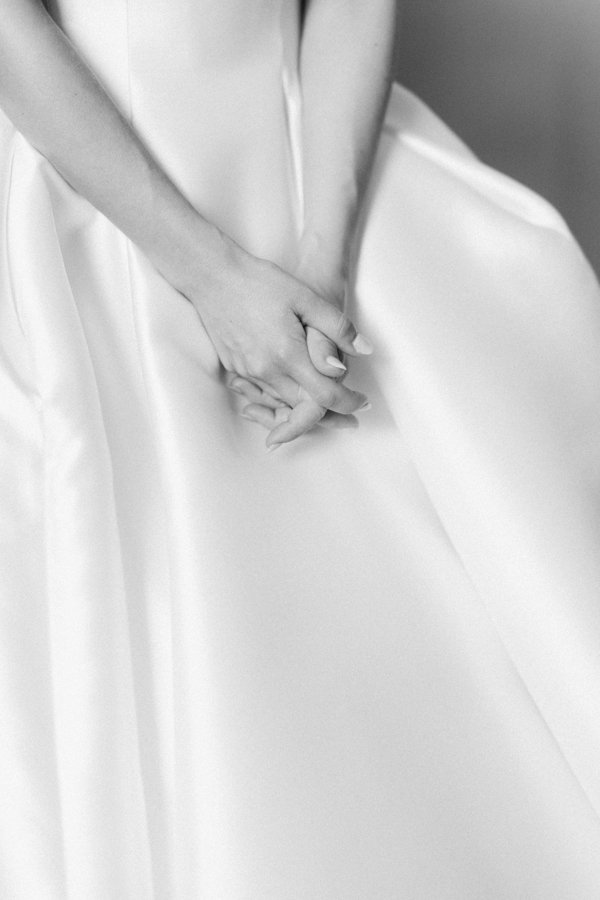 black and white photo of bride's hands at the Calgary Fairmont Palliser Hotel
