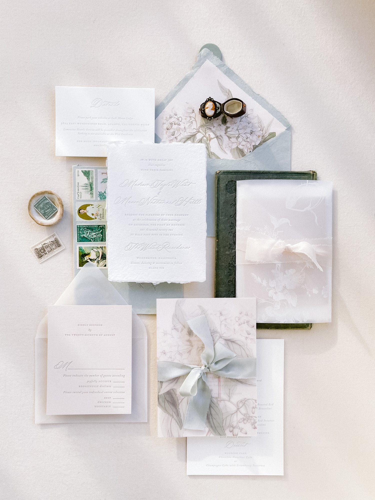 a custom luxury wedding invite suite flat lay by Plume Calligraphy wedding stationery in Calgary